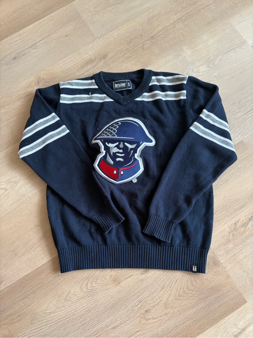 Navy V-Neck Stripe Sweater with Helmet Logo
